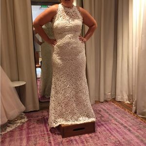 Size 14 Anthropologie wedding dress. Never altered or worn.